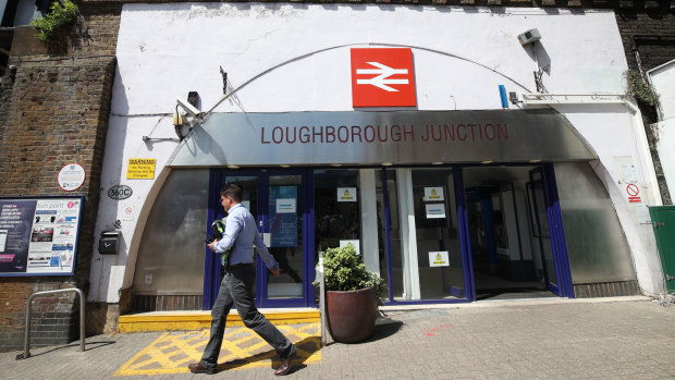 A man walks past Loughborough Junction railway station in south London.