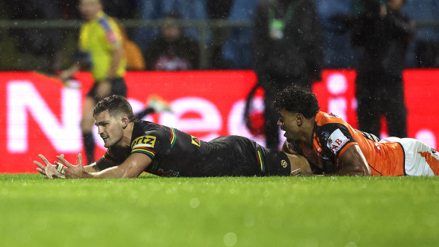 Nathan Cleary spills the ball after Jahream Bula’s try-saving tackle on Saturday night.