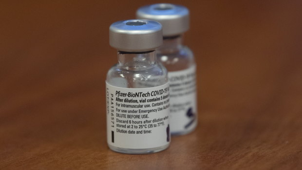 Two empty vials of the Pfizer-BioNTech COVID-19 vaccine.