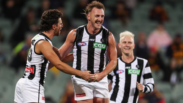 Lynden Dunn celebrates kicking a goal in his comeback game from knee reconstructions.