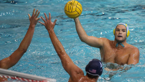 Nathan Powers of Australia with the ball during the Water Polo Test Match match between Australia and USA at the Brisbane Aquatic Centre.