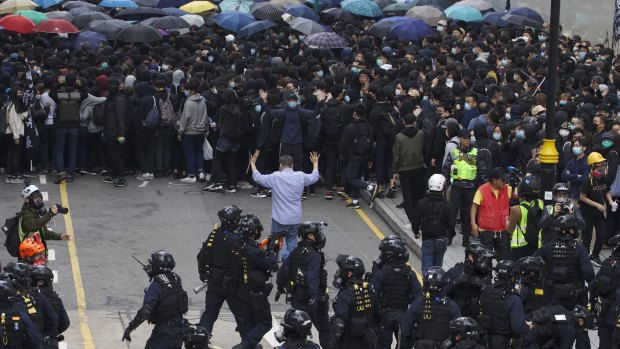 The protesters were chanting: "We want real universal suffrage" and "Disband the police force, free Hong Kong".