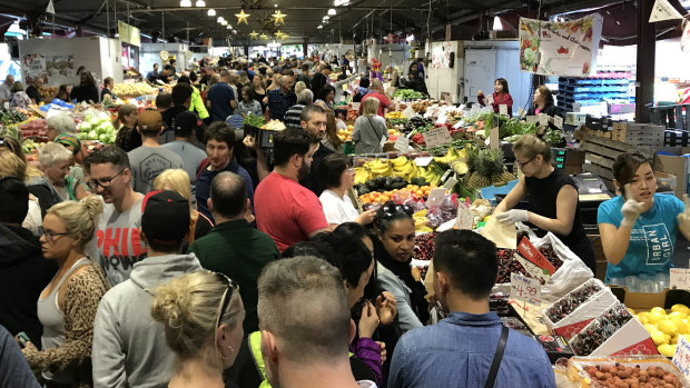 Shoppers at Queen Victoria Market on Christmas Eve in 2018.