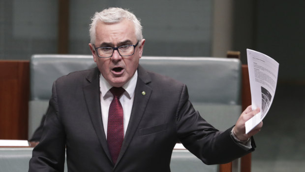 Independent MP Andrew Wilkie attempts to table the ClubsNSW internal document at Parliament House on Thursday.