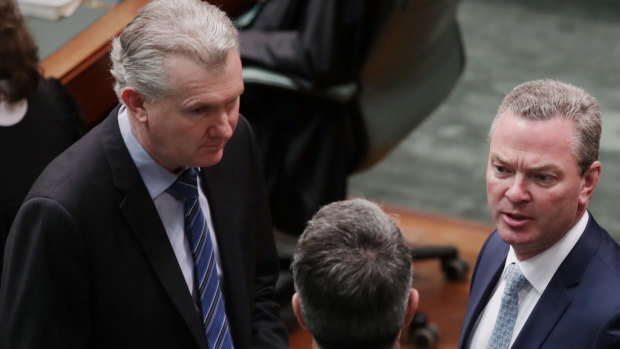 Manager of opposition business Tony Burke, left, and leader of the house Christopher Pyne, right, in Parliament in a file picture.