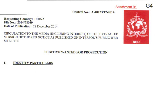 A redacted red notice from Interpol for a man improperly accused of kidnapping in China. 