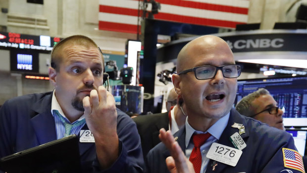 Wall Street remains near record highs despite the US economy being battered by the pandemic. 