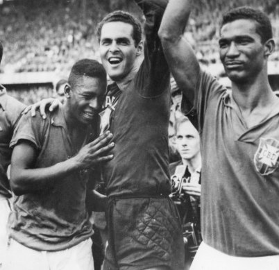 Brazil’s 17-year-old Pele, left, weeps on the shoulder of goalkeeper Gylmar Dos Santos Neves, as Didi stands right, after Brazil’s 5-2 victory over Sweden in the 1958 World Cup final.