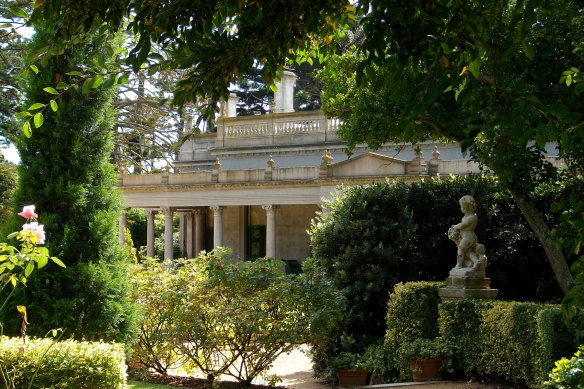 A glimpse of the 1860s villa through the garden.