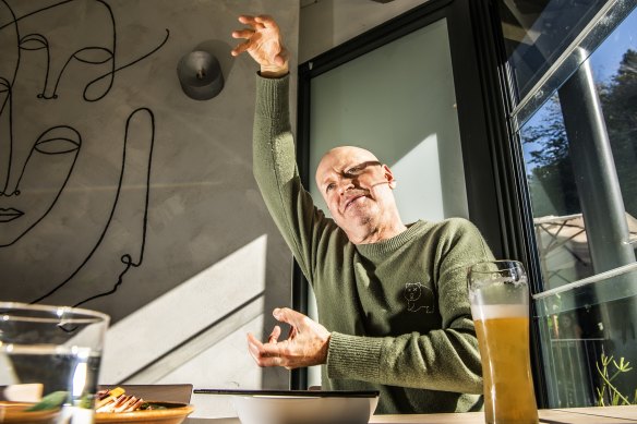 Professor Doug Hilton, chief executive of the CSIRO, talks protein purification while dining within Sydney’s Botanic Garden.