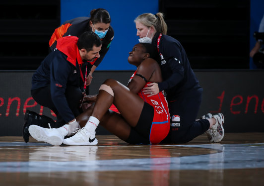 Sam Wallace grimaces in pain after rupturing her ACL on Saturday night. 