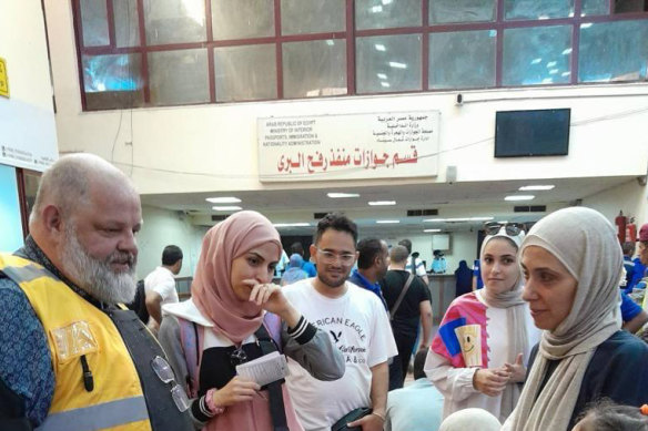 Australians being met by DFAT officials at the Rafah border crossing in Egypt earlier this week.