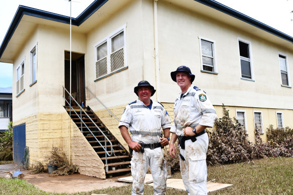 Senior constables Ben King and Adam Davis rescued a 93-year-old woman on a boogie board out her window. 