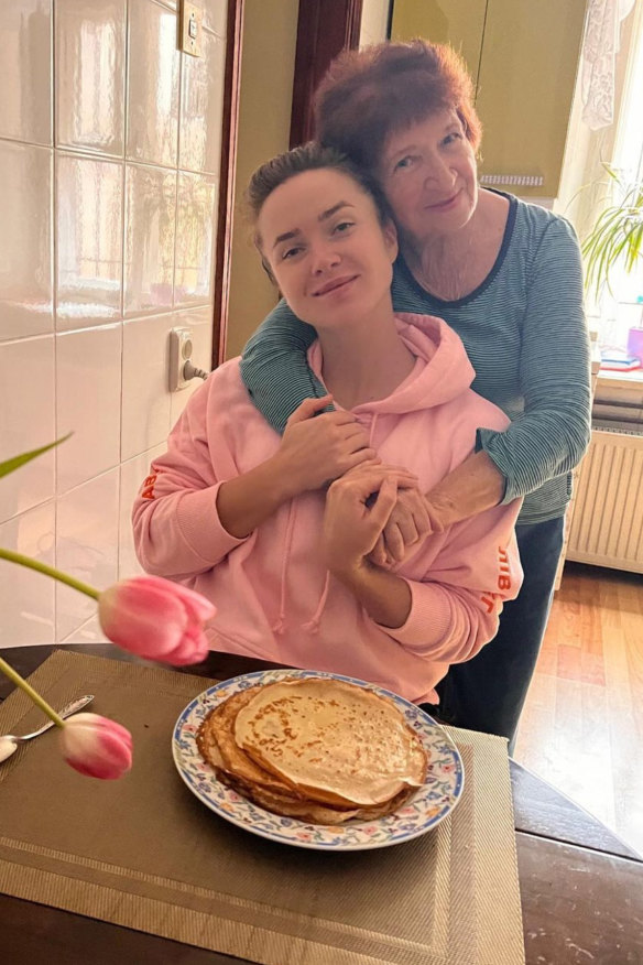 With her grandmother, who has stayed in Ukraine through the invasion.