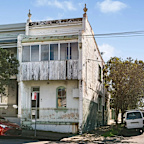 Despite its crumbling condition, the home sold for $355,000 more than its reserve.