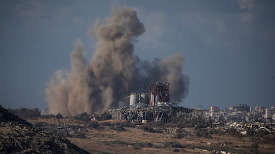Smoke rises over Gaza during Israeli bombardment as seen from the Israeli side of the border.