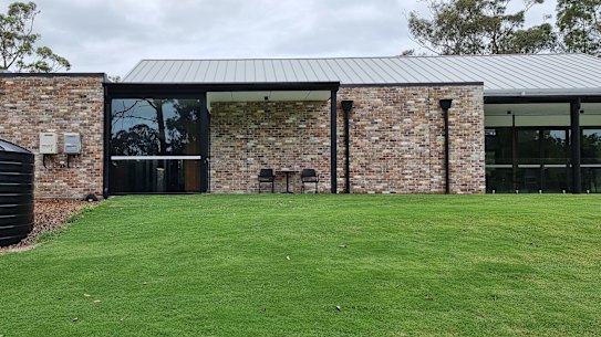 Timber-framed bi-fold glass doors can be pulled right back to allow for the indoors and outdoors to blur.