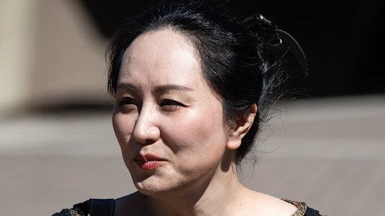 Meng Wanzhou leaves her home to attend the extradition hearing in Vancouver on Wednesday. 