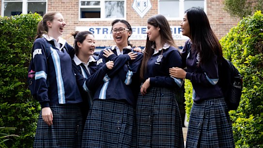 Strathfield Girls' students Annabel Knight, Gina Lee, Jenny Yang, Devika Coleman and Sela Deng were glad to finish the first English exam.