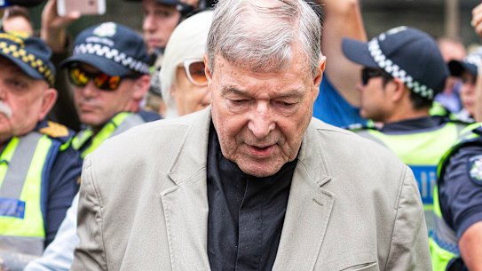 Cardinal George Pell leaves Melbourne's County Court after his guilty verdict was made public.