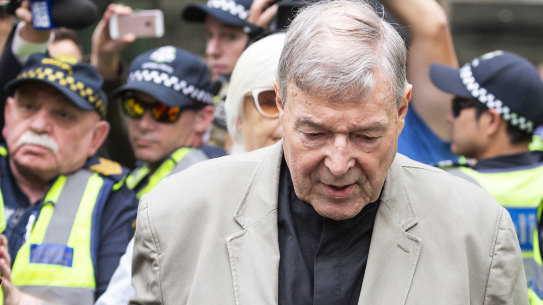 Cardinal George Pell leaves Melbourne's County Court after his guilty verdict was made public.