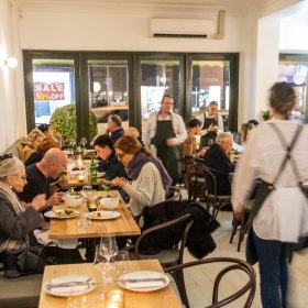 Inside the bustling restaurant.