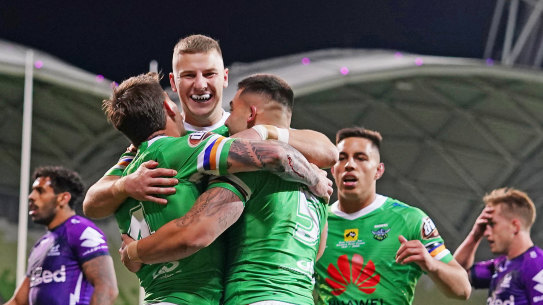 George Williams celebrates a Canberra try as the Raiders give the Storm a lesson last weekend.