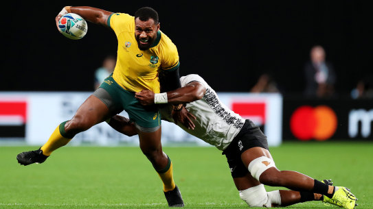 Kerevi is tackled by Dominiko Waqaniburotu during Australia's win over Fiji.