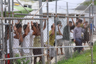 Asylum seekers in the detention centre on Manus Island in 2014.