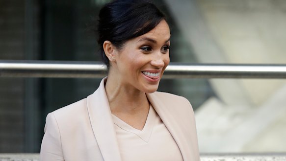 The pregnant Duchess of Sussex leaves the National Theatre in London. 