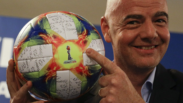 FIFA president Gianni Infantino, with the official ball for this year's Women's World Cup in France.