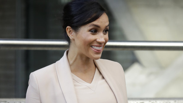 The pregnant Duchess of Sussex leaves the National Theatre in London. 