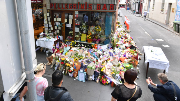 Tributes at Pellegrini's in Melbourne's Bourke Street. Friday's incident in Victoria was cited by Queensland's Attorney-General when announcing the legislation.