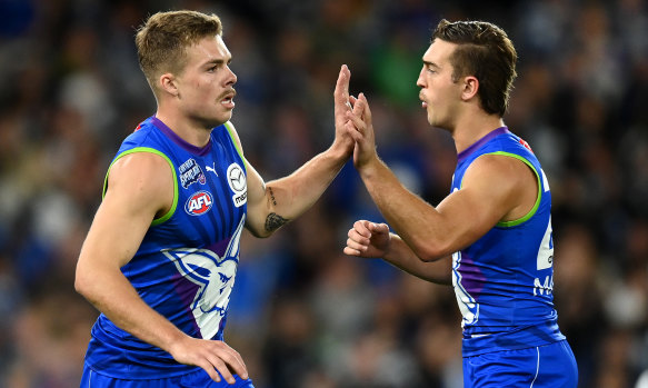 Top-three pick Will Phillips (right) is stuck in North Melbourne’s reserves.