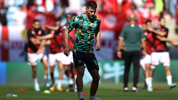 Ajdin Hrustic warms up before the Socceroos’ win over Tunisia.