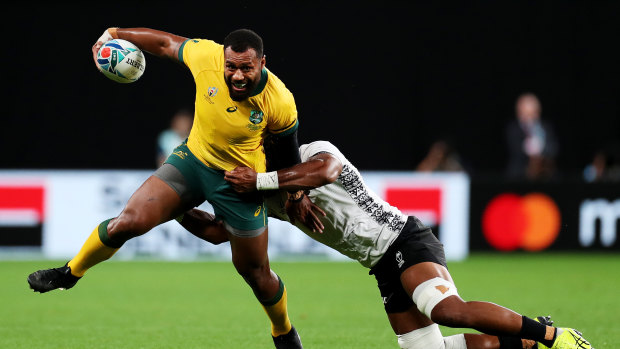 Kerevi is tackled by Dominiko Waqaniburotu during Australia's win over Fiji.
