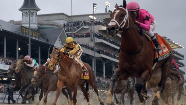 Luis Saez on Maximum Security leads Flavien Prat on Country House in the Kentucky Derby.