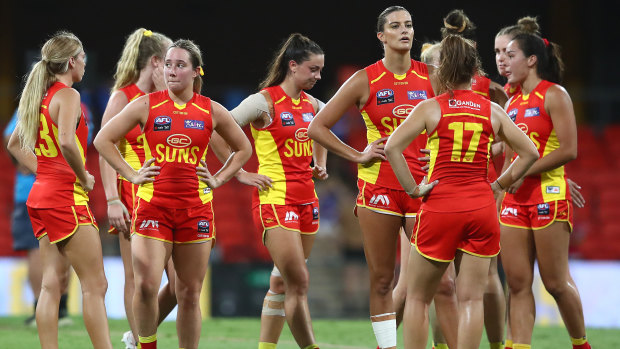 The look on their faces says it all: The Gold Coast Suns after their draw against the Western Bulldogs.