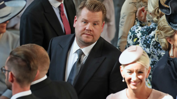 James Corden and Julia Carey arrive in St George's Chapel at Windsor Castle for the wedding of Prince Harry and Meghan Markle.