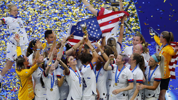 The US women's soccer team celebrate after winning the World Cup.