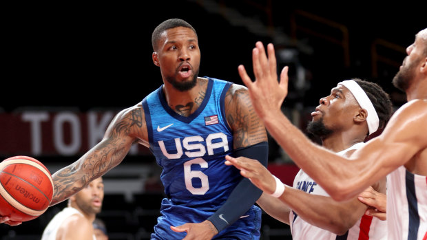 Damian Lillard Team United States looks to pass against Team France.