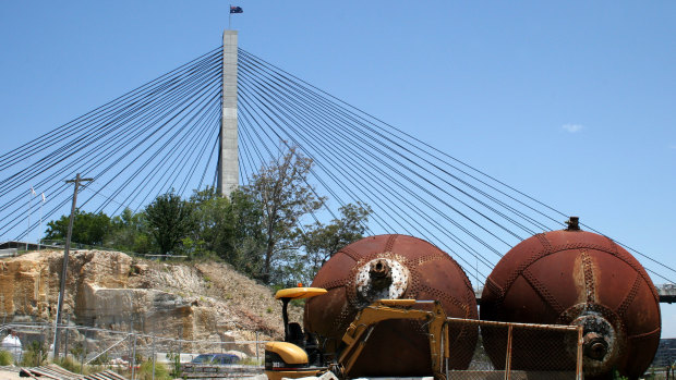 Two giant steel balls salvaged from the CSR sugar refinery were later installed in a harbourside park in Pyrmont.