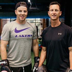 Adam Peacock and Bondi Rescue lifeguard Dean Gladstone had a rumble during a boxing session.