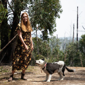 Writer Alice Bishop and Scout in Christmas Hills, Victoria, near the family home which was destroyed on Black Saturday in 2009.