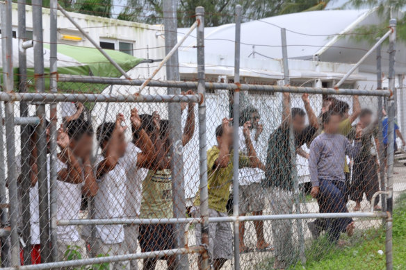 People seeking asylum in a detention centre on Manus Island in 2014.