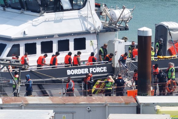 A UK Border Force vessel brings migrants intercepted crossing the English Channel into Dover port this month.