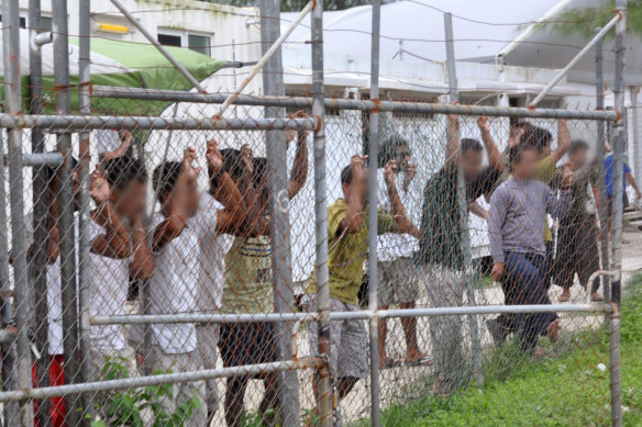 Asylum seekers in the detention centre on Manus Island in 2014.