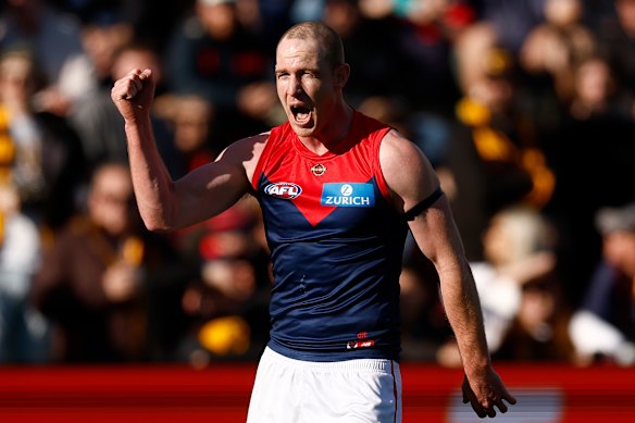 Harrison Petty of the Demons celebrates a goal.