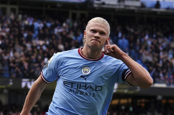 Erling Haaland celebrates his hat-trick goal against Manchester United on Sunday.