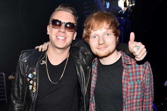 Macklemore and Ed Sheeran, pictured in 2014. Four other of Sheeran’s opening acts have dropped out of his tour supporting Macklemore.
